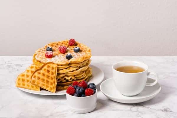 Belgian Waffles Berries And Cup Of Tea