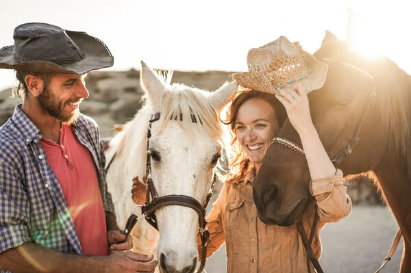 Couple Having Fun With Horse